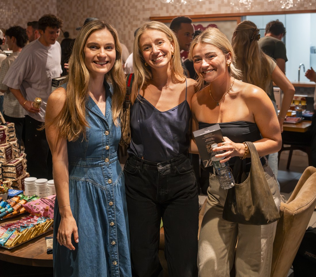 Three women together at an NYC Health Collective event