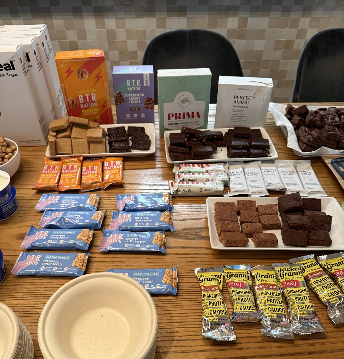 A table of protein bars and brownies at High Protein Night